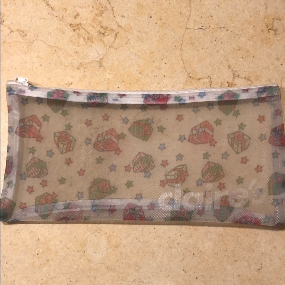 Claire’s “gift” zippered bag.